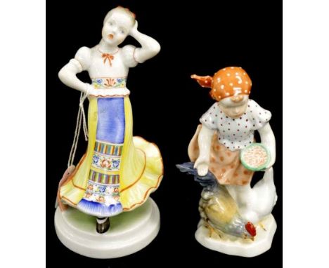 Two Herend Hungary ceramic figures including Girl Feeding a Rooster, (height 14cm approx); and Young Dancer, (height 17cm app
