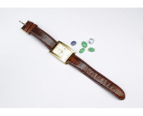 Loose gemstones and a Citizen watch includes a a heavy includes Aquamarine with chip to girdle, an opal triplet and three chr