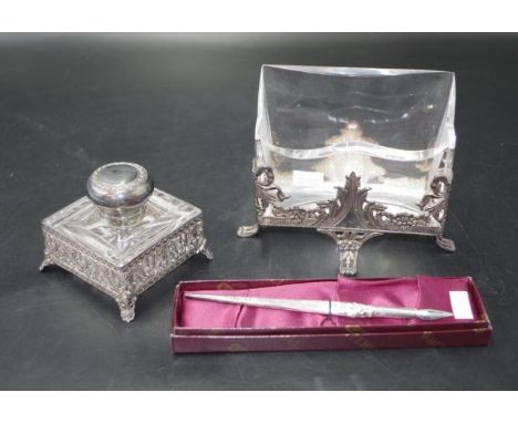 Three piece Whitehill pierced silver plate deskset with Atlantis cut glass inserts,comprising a inkwell, nib pen, and a lette