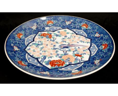 Large Japanese ceramic shallow bowl hand painted pheasant and blossom decoration, marked to base, (diameter 45cm approx).