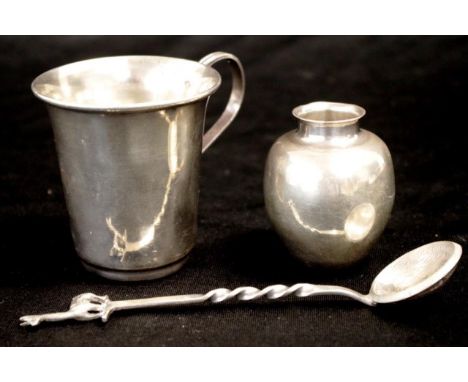 Three Peruvian silver tableware items including cup, posy vase, and decorative spoon, with llama finial, and Peruvian coin se