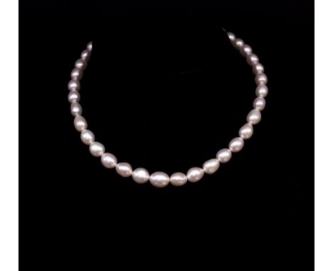 Australian South Sea pearl necklace by Paspaley with semi baroque - oval shape, white in colour. Approx 40x pearls 8mm-10mm i