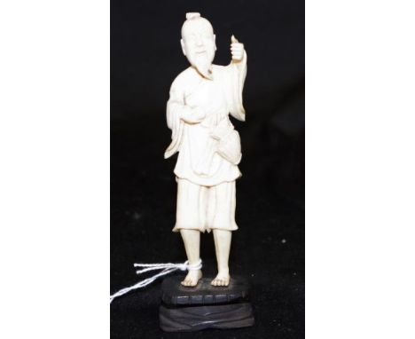 Vintage carved ivory gentleman figure on a timber base, height 13.5cm approx., This item cannot be exported