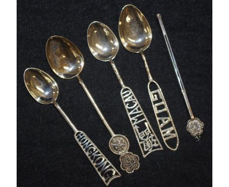 Four Chinese silver souvenir coffee spoons each with decorative souvenir finial; together with a extendable swizzlestick, wit