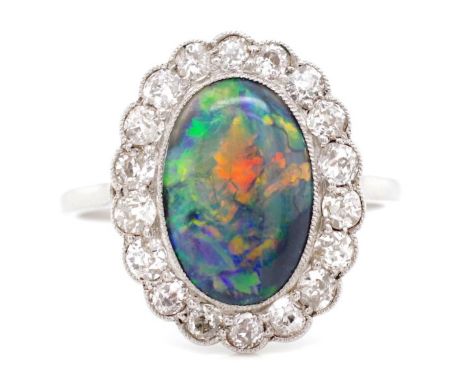 Black opal and diamond set halo ring 18x old cut diamonds 2.3mm-2.5mm dia, opal cabochon size 12.5mm x 8.3mm x 3.55mm, ring w