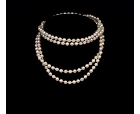 Vintage double strand pearl necklace with a floral decorated box clasp, marked sterling, approx pearl size 6.5mm, necklace le
