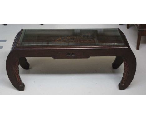 Chinese hardwood coffee table with drawer and carved glass covered top, 107cm wide, 43cm deep, 41.5cm high