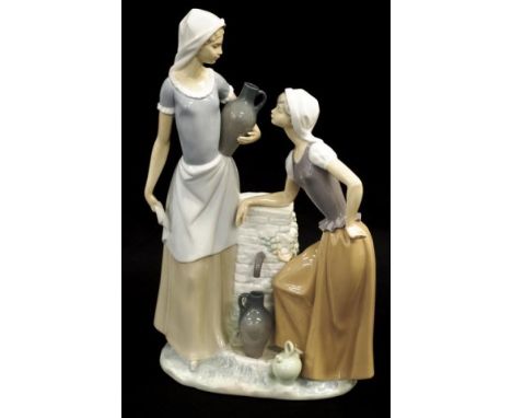 Large Nao Women at the Water Well figure marked to base, (height 39cm approx).