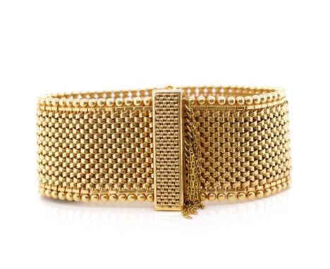 18ct yellow gold mesh bracelet with ball finial decoration, marked 18k to the swivel clip clasp. Approx width 29.5mm, length 