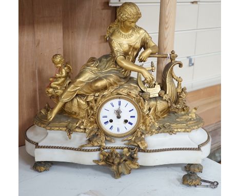 A 19th century French neoclassical revival figural ormolu and white marble clock, 39cm tall