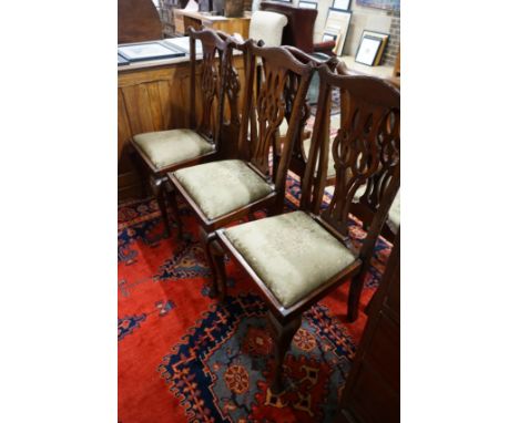 A set of six Chippendale style mahogany dining chairs