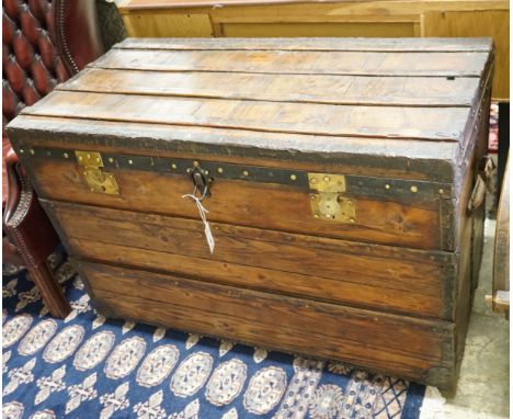 A Victorian iron and brass mounted trunk, length 109cm, depth 54cm, height 70cm