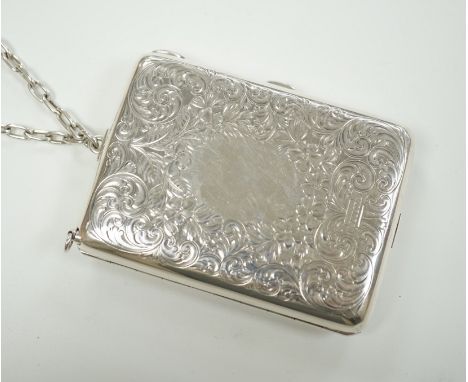 An early 20th century American engraved sterling rounded rectangular combination aide memoir, purse, pill box, sovereign and 