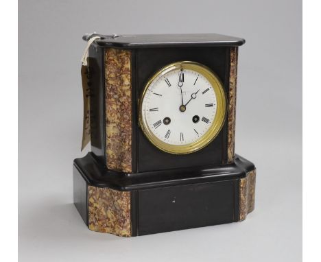 A black slate and marble mantel clock, 22cm