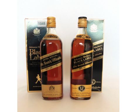 2 bottles of Johnnie Walker Black Label 12 yr Old Scotch Whisky circa 1970's with boxes and different labelling 40% 75cl