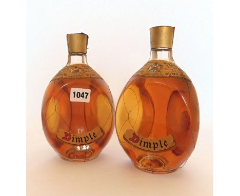 2 bottles of Dimple old blended Scotch Whisky by John Haig & co ltd both circa 1970's 70 proof 26 2/3 fl oz 