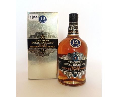 A bottle of Teacher's Royal Highland12 yr old De Luxe Blended Scotch Whisky with box circa 1970's 43% 75 proof 26 2/3 fl oz 7