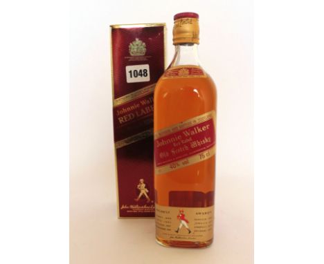 A bottle of Johnnie Walker Red Label Old Scotch Whisky circa 1970's with box 40% 75cl 