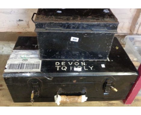 A black painted tin travelling trunk and a deed box