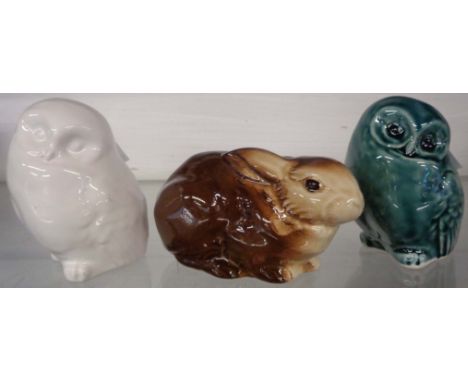 Three pieces of Poole Pottery comprising two owls and a rabbit