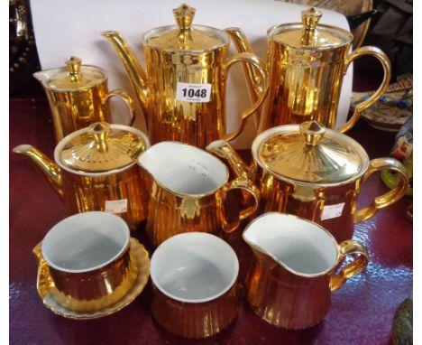 A quantity of Royal Worcester gilt teaware