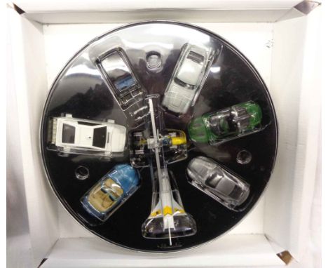 A boxed Corgi TY99135 James Bond Collection film canister eight piece set 