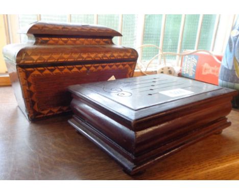 A music box and an antique tea caddy with later mirrored lid