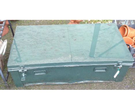 An old painted tin transit trunk