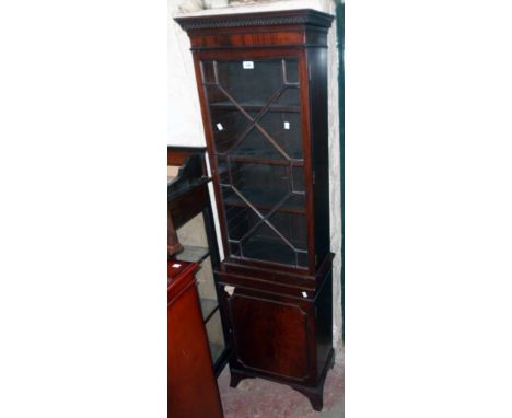 A 20" 19th Century mahogany glazed book cabinet, set on cupboard base with bracket feet