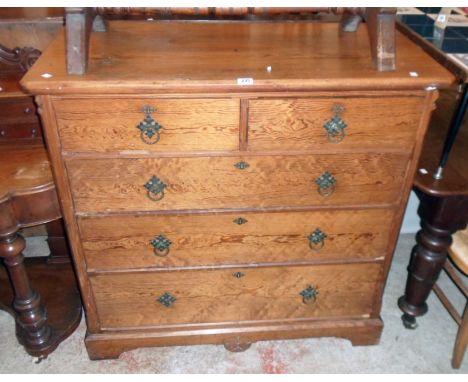 A 3' 8" Victorian pitch pine chest of two short and three long graduated drawers, set on bracket feet