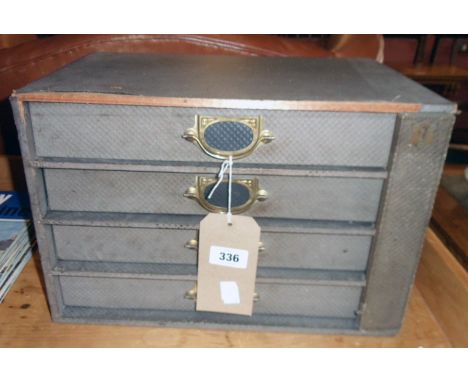 A 15 1/2" vintage Advance (The Library Cabinet) with grey paper covering and four bracket locking long drawers