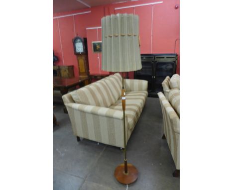 A teak standard lamp 