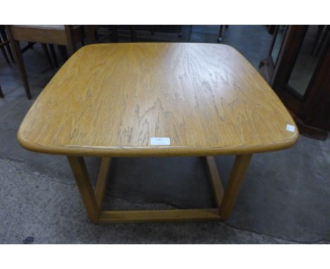 A Danish style light oak coffee table 