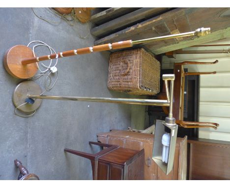 A brass standard lamp and a teak standard lamp 