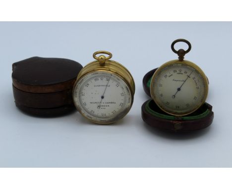 Negretti and Zambra, an Edwardian leather cased pocket barometer/ thermometer with floating compass, together with another po