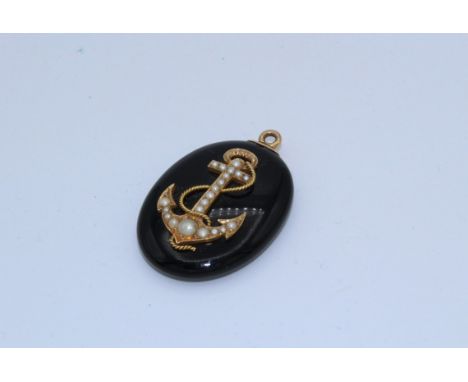 A Victorian onyx and seed pearl mourning locket, with vacant locket. Measures&nbsp;approximately&nbsp; 45 x 30mm with unmarke
