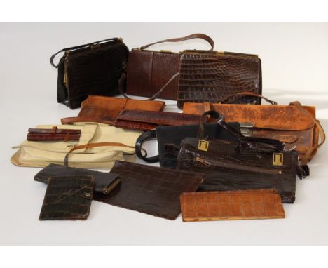 A collection of a dozen vintage faux crocodile and other lady's handbags, together with an Edwardian leather satchel