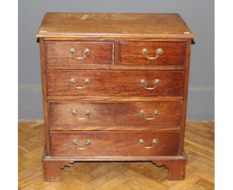 An Edwardian mahogany chest of George III design, fitted two short and three long drawers on bracket feet. 78cm wide&nbsp;