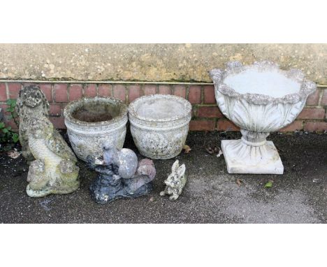 A reconstituted stone petal moulded garden planter, 45 x 49cm, together with four animal garden ornaments including squirrel,