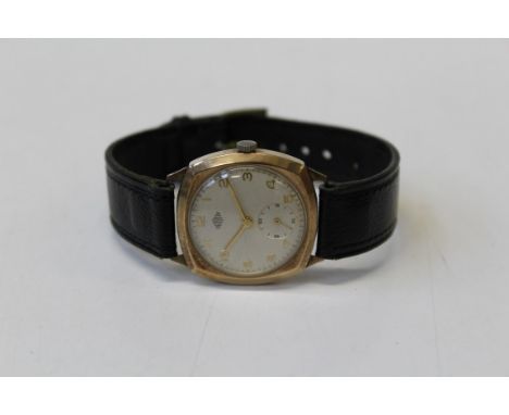 A 1950's gold Derrick gentleman's wristwatch featuring a champagne dial with gold Arabic numerals. With subsidiary second dia