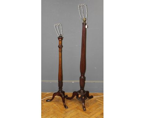 Two mahogany standard lamp bases, one with reeded column, together with another, converted from a pole screen 145cm (the tall