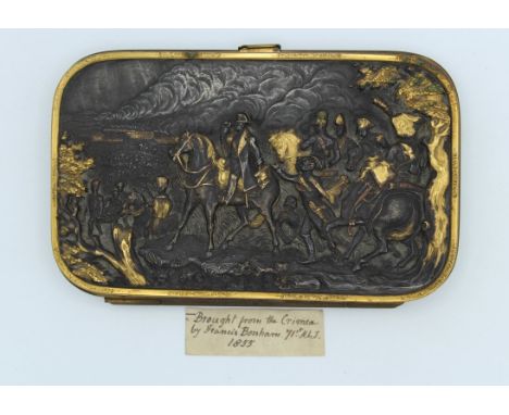 Crimea War interest, a 19th century French gilt metal, hide and salmon silk lined card case, the cover embossed with Napoleon