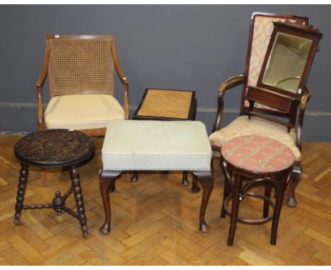 An Edwardian cane upholstered open armchair, a mahogany wall mirror with glove box, bobbin turned stool, two other stools and
