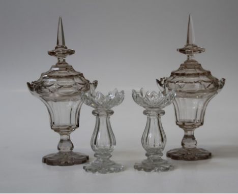 A pair of 19th century lead crystal pedestal bowls and covers, each with spike finial on lobed foot, 40cm together with a pai