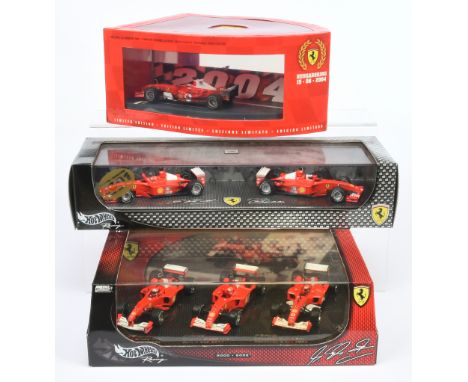 Hot wheels 1/43rd scale Michael Schumacher racing group (1) hungaboring 2004 - 2 model set (2) 2000 - 2002 - 3 model set (3) 