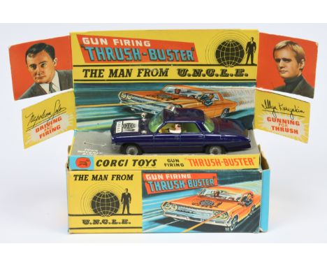 Corgi 497 "The Man from UNCLE" Oldsmobile Super 88 Thrushbuster - blue, yellow interior, plastic lamps, cast hubs - one lamp 