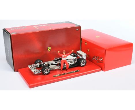 Hot Wheels 1/18th scale C7332 Ferrari M. Schumacher six time World Champion, chrome finish and leatherette plinth - Near Mint