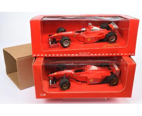 Minichamps (Paul's Model Art) 1/18th scale pair (1) 981803 Ferrari M. Schumacher F 300, (2) 970005 Ferrari M. Schumacher F310