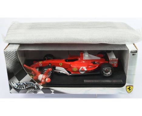 Hot Wheels 1/18th scale B6200 Ferrari M. Schumacher - 'Simply the Best, 7 times World Champion', also includes F 2004 World C