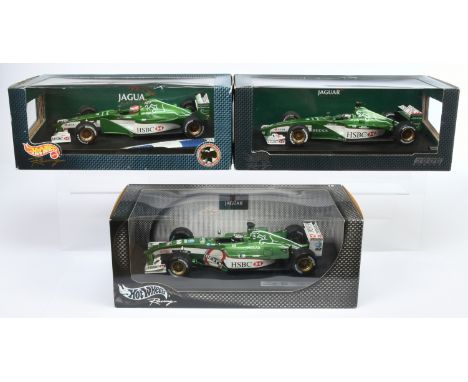 Hot Wheels 1/18th scale group (1) 26699 Jaguar 2000, (2) 26741 Jaguar 2000 Eddie Irvine, (3) 54628 Jaguar Eddie Irvine - Near